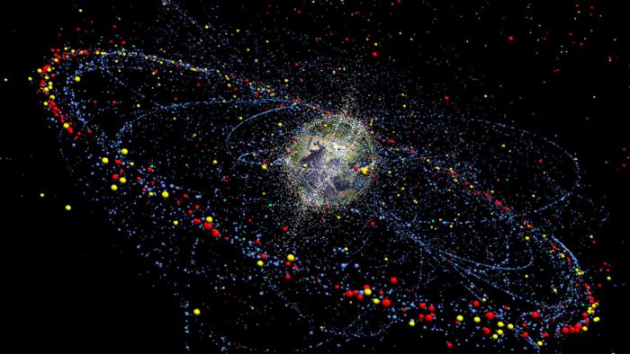 FILE - An undated handout photo for the European Space Agency ESA shows a computer simulation made by the Institute for Air and Spacesystems at the Technical University of Braunschweig, Germany, of the distribution and movement of space debris at present and in future. (AP Photo/TU Braunschweig, File)